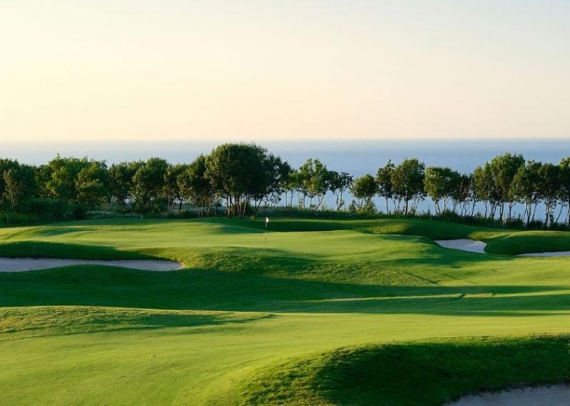 lighthouse golf fairway and background sea view