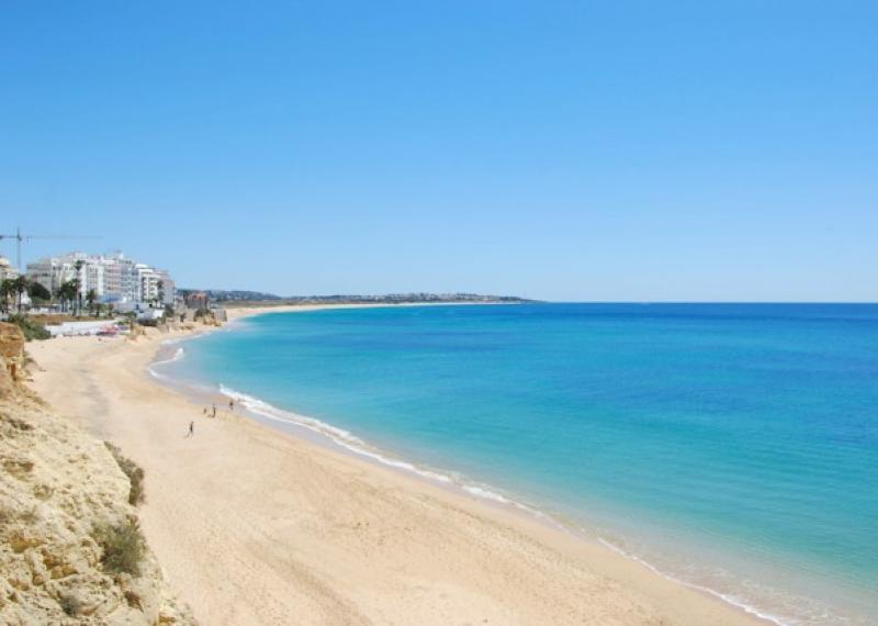 Beach in Algarve with blue sea