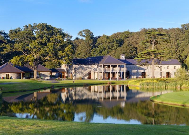 Clubhouse at Fota Island Resort with lake and surrounding panorama