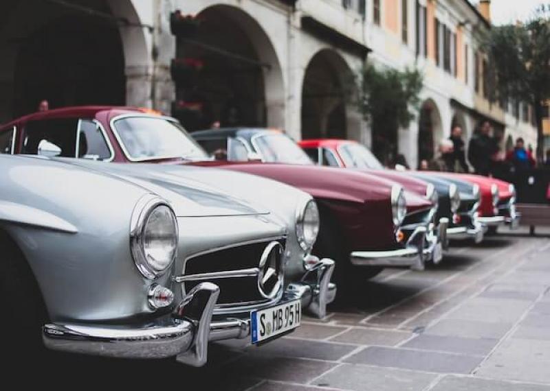 Vintage cars parked on the street in Brescia