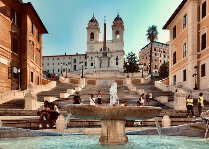 Piazza di Spagna with steps and fountain in the foreground