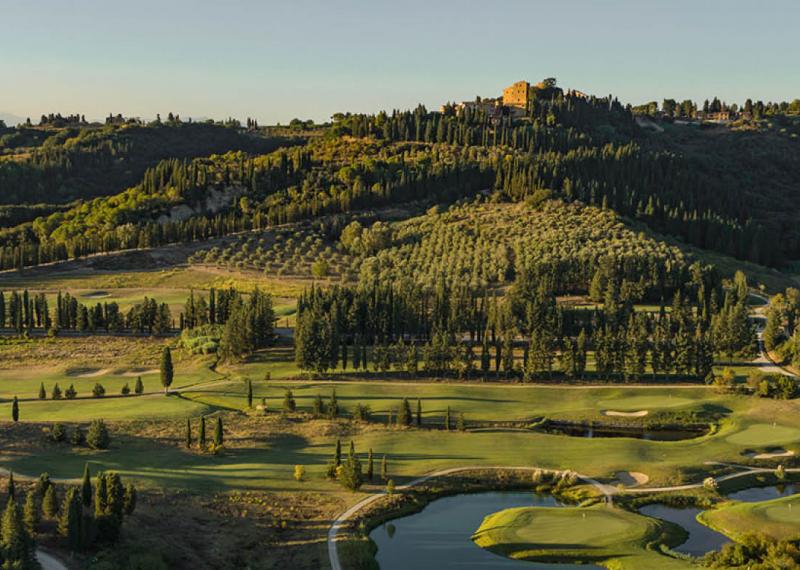 Castelfalfi course view with hills in the background