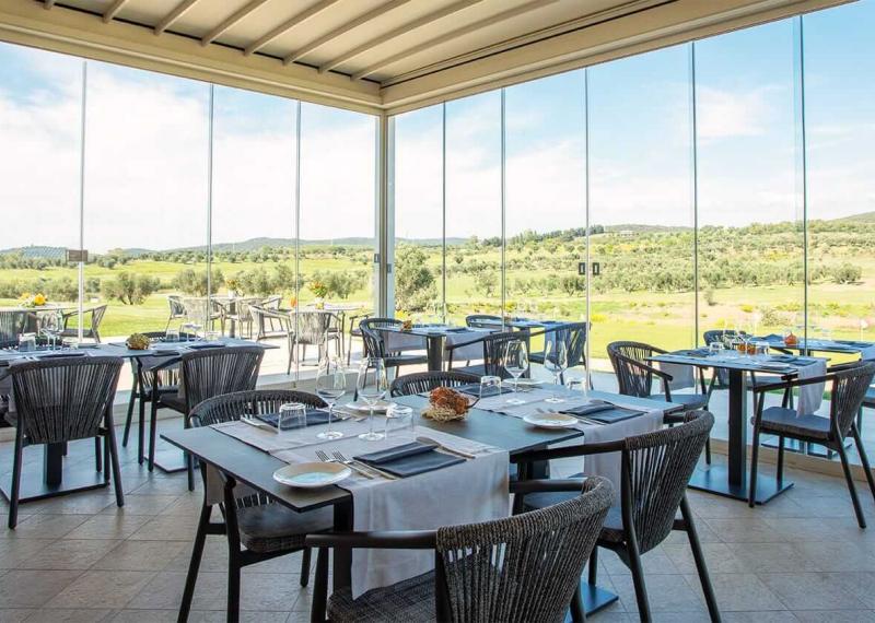 Restaurant at Riva Toscana with tables set