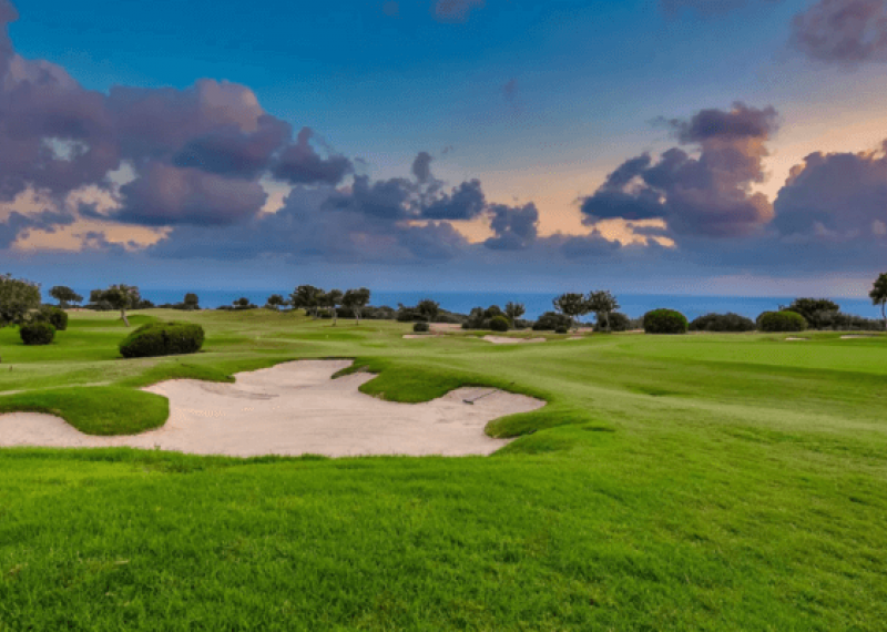 Aphrodite Hills course view at sunset