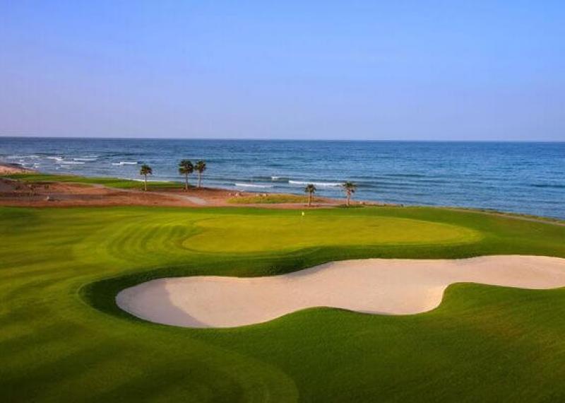 Jebel Sifah Golf Course bunkers, green and sea view