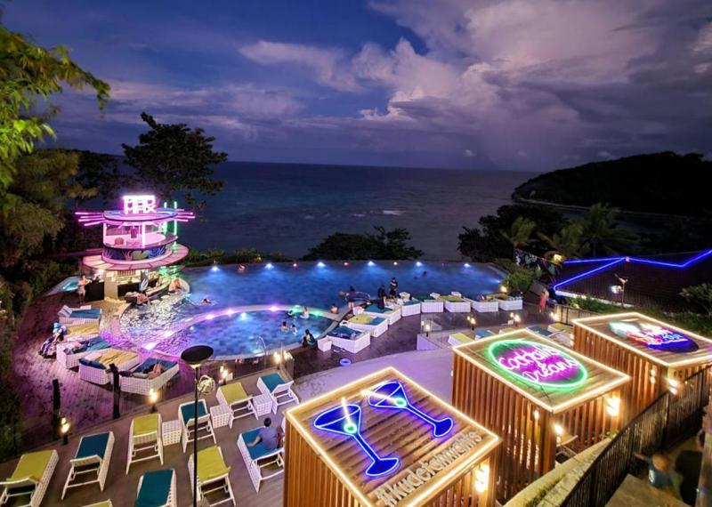 fairways and bluewater resort by night with lit on buildings